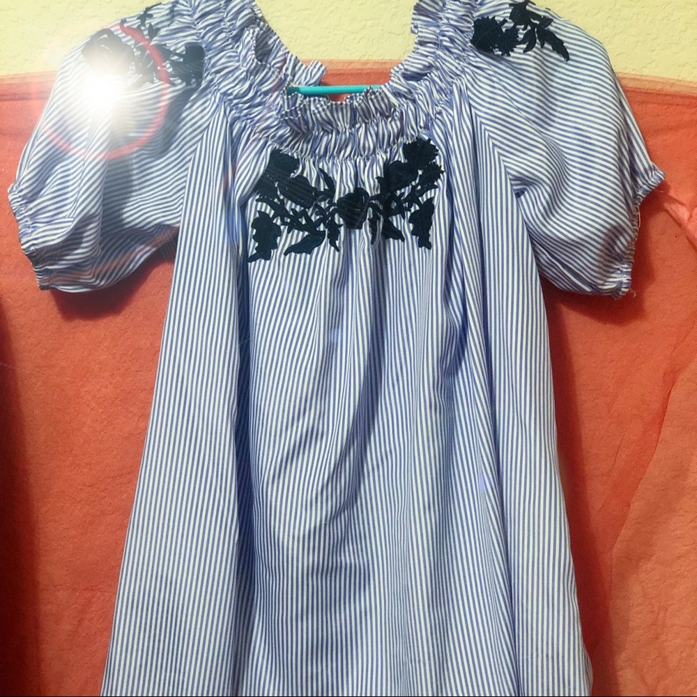 Striped blue off the shoulder top.